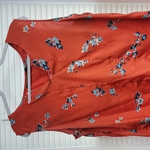Orange Attention xl blouse with floral pattern.